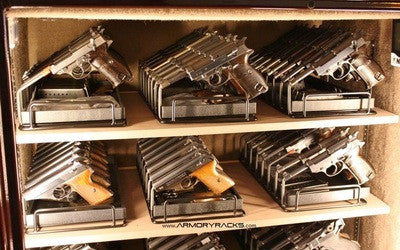 Handgun collection organized with Armory Racks in a gun safe